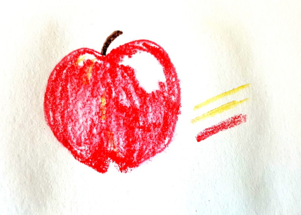 apple drawn with dry pencils on wet paper